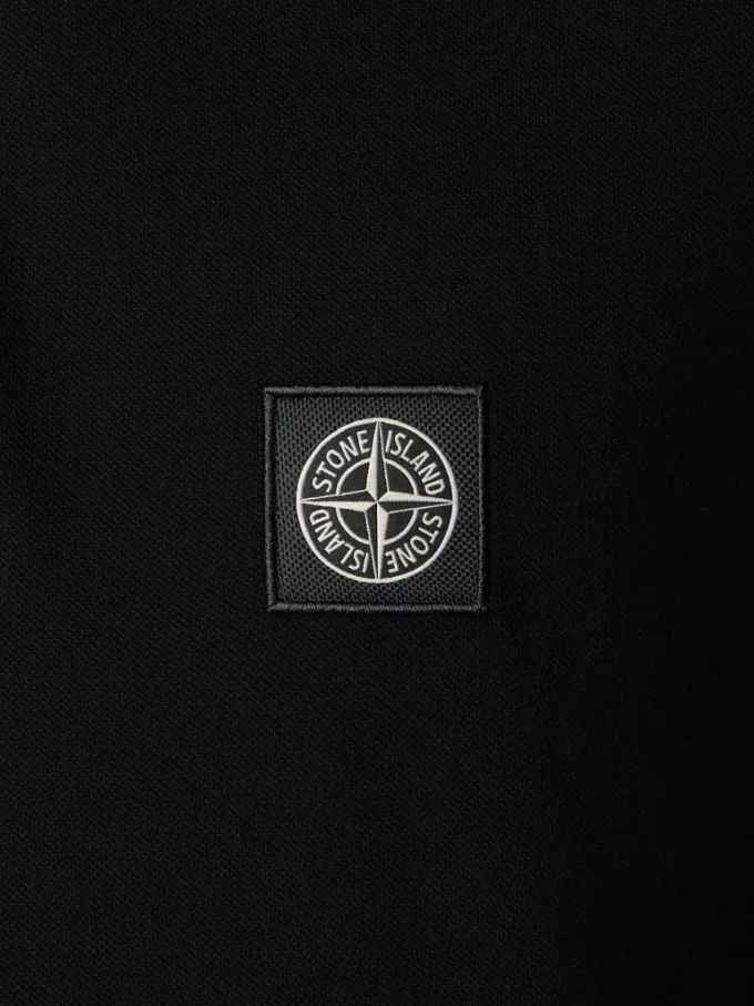 Polo slim fit a maniche corte con toppa Compass