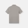 Polo slim fit a maniche corte con toppa Compass