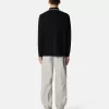 Polo slim fit a maniche lunghe con dettagli a righe