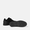 Sneaker stringata con bordo in gomma e suola carrarmato
