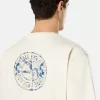 T-shirt a maniche corte con stampa “Compass Camo”. T-shirt a maniche corte con stampa “Compass Camo”.