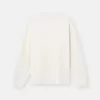 T-shirt a maniche lunghe dalla vestibilità regolare con toppa Compass tono su tono. T-shirt a maniche lunghe dalla vestibilità regolare con toppa Compass tono su tono.